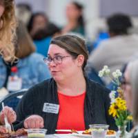 Attendees mingling prior to event start 27